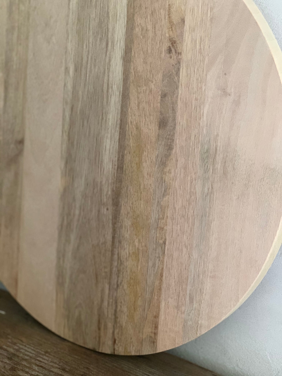 large round cutting board – Lauren Liess