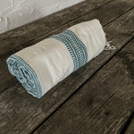 handwoven bath + beach towel- natural with blue