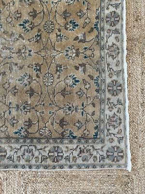 floral muted jewel toned vintage rug - 3’-8” x 6’-9”