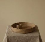 unglazed clay candle holder