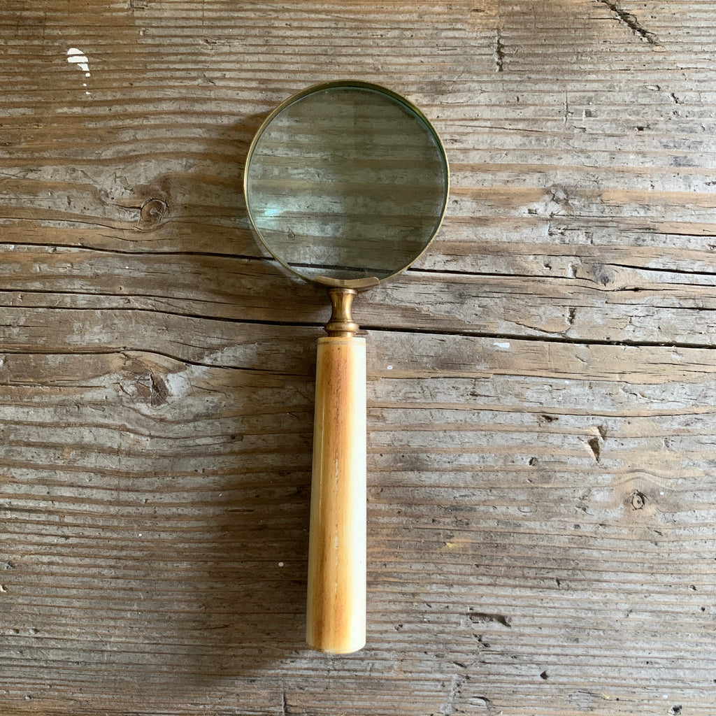 magnifying glass with aged ivory resin handle