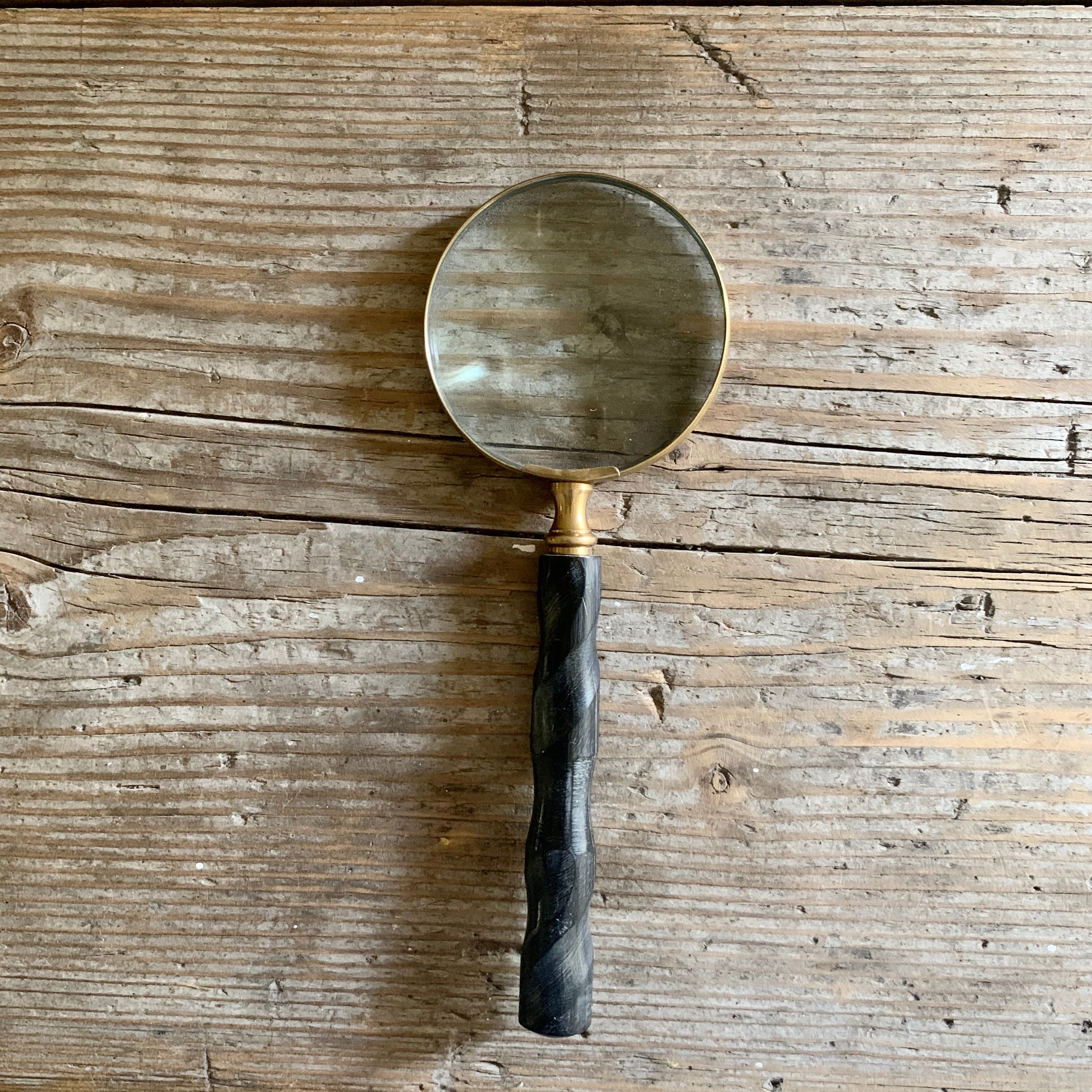 magnifying glass with black resin twist handle