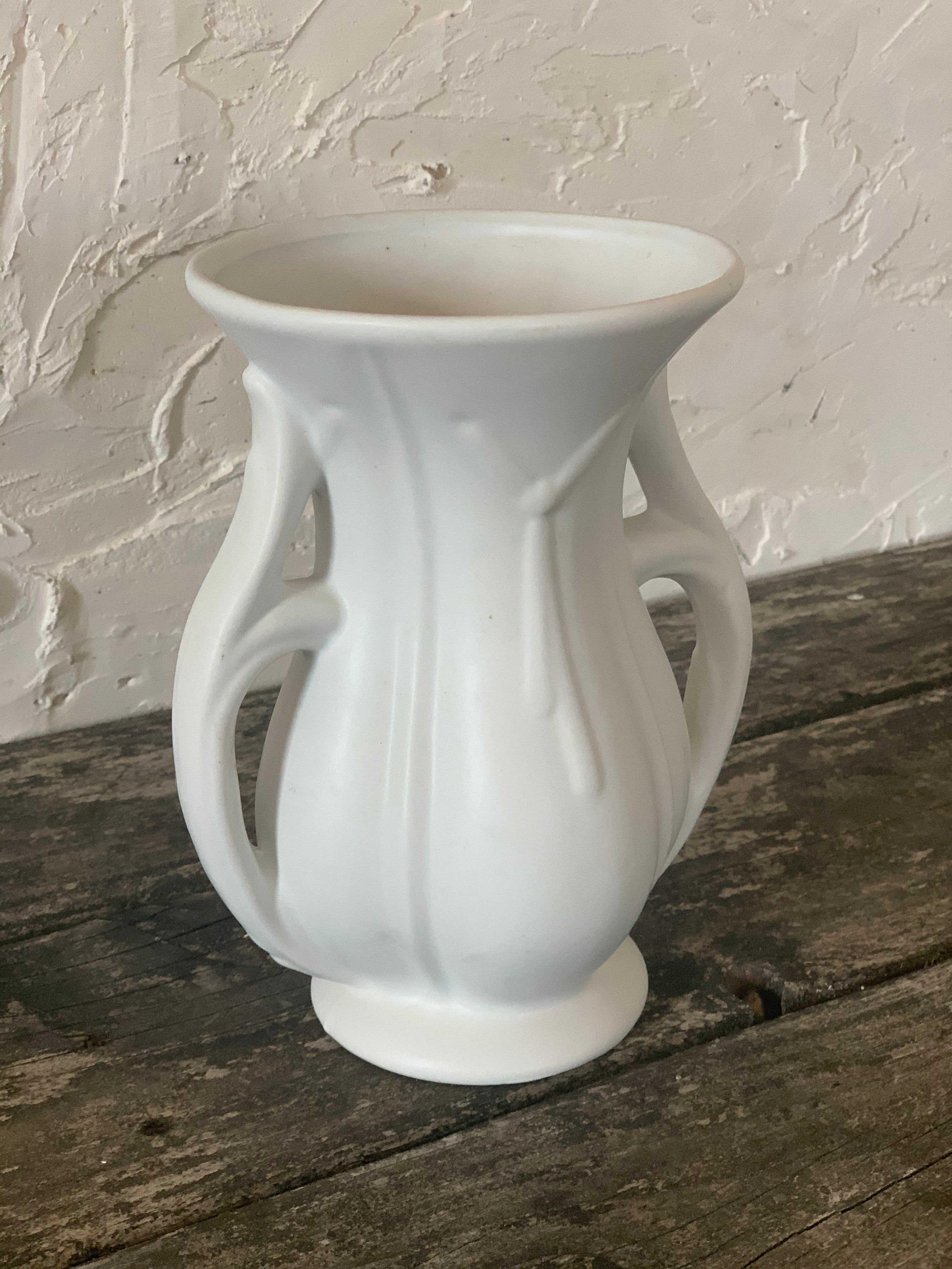 sculptural flower vase with acanthus handles
