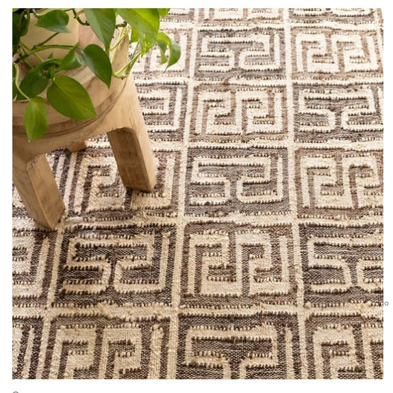 brown patterned woven jute rug