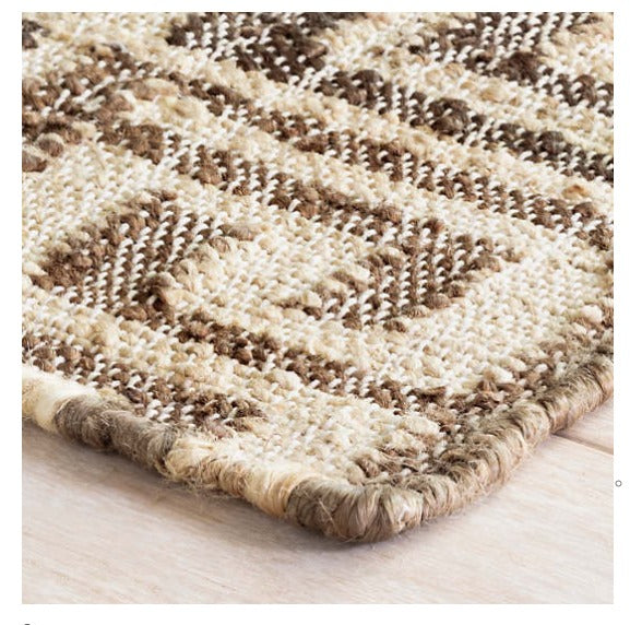 brown patterned woven jute rug