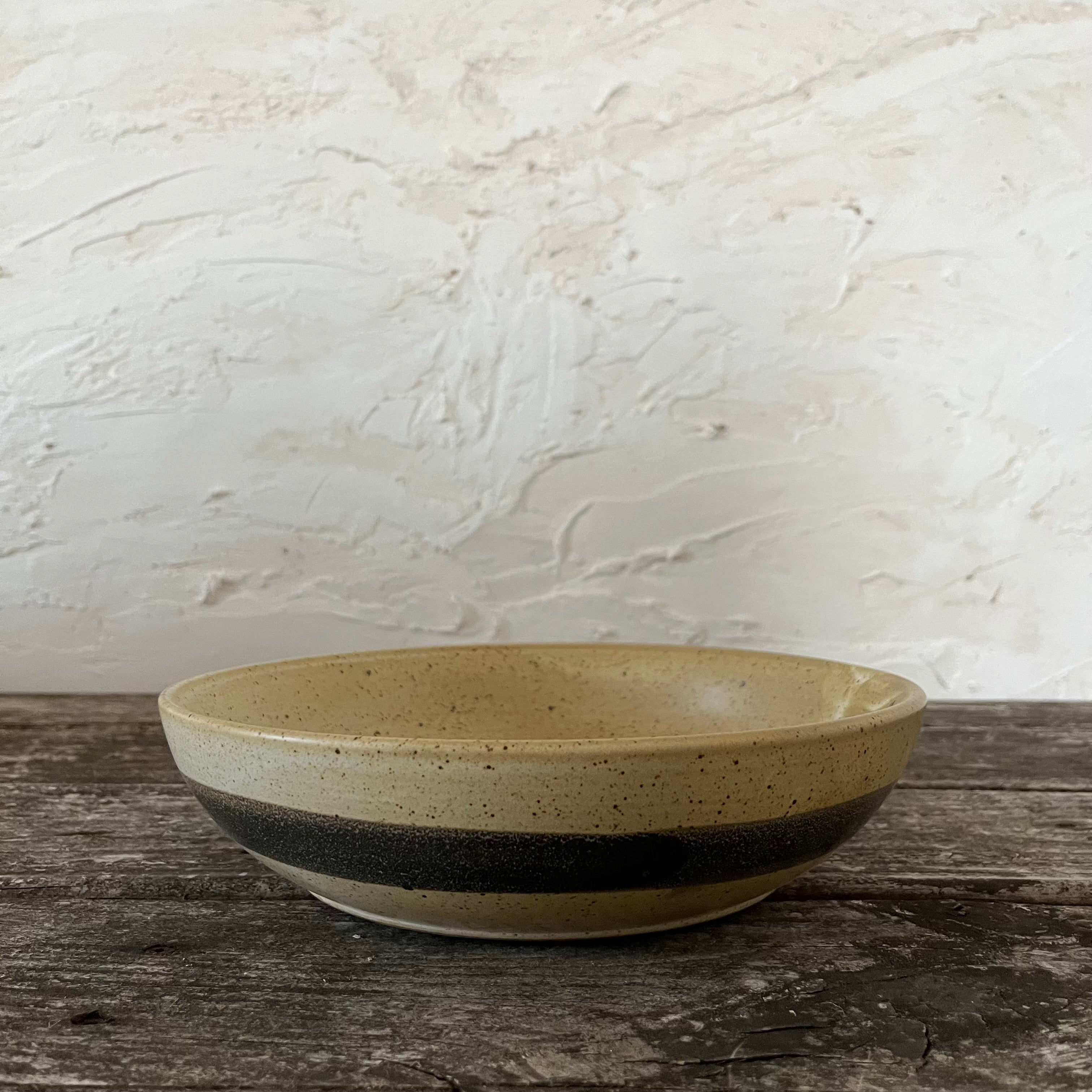 yellow ware serving bowl with brown stripe