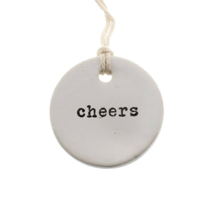 ceramic “cheers" gift tag for wine