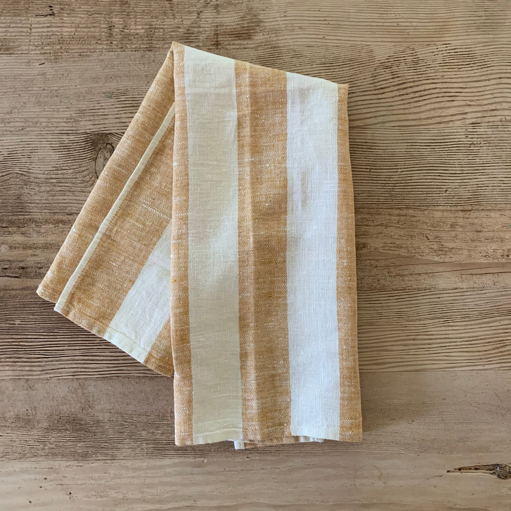 pair of linen hand towels with wide stripes- gold